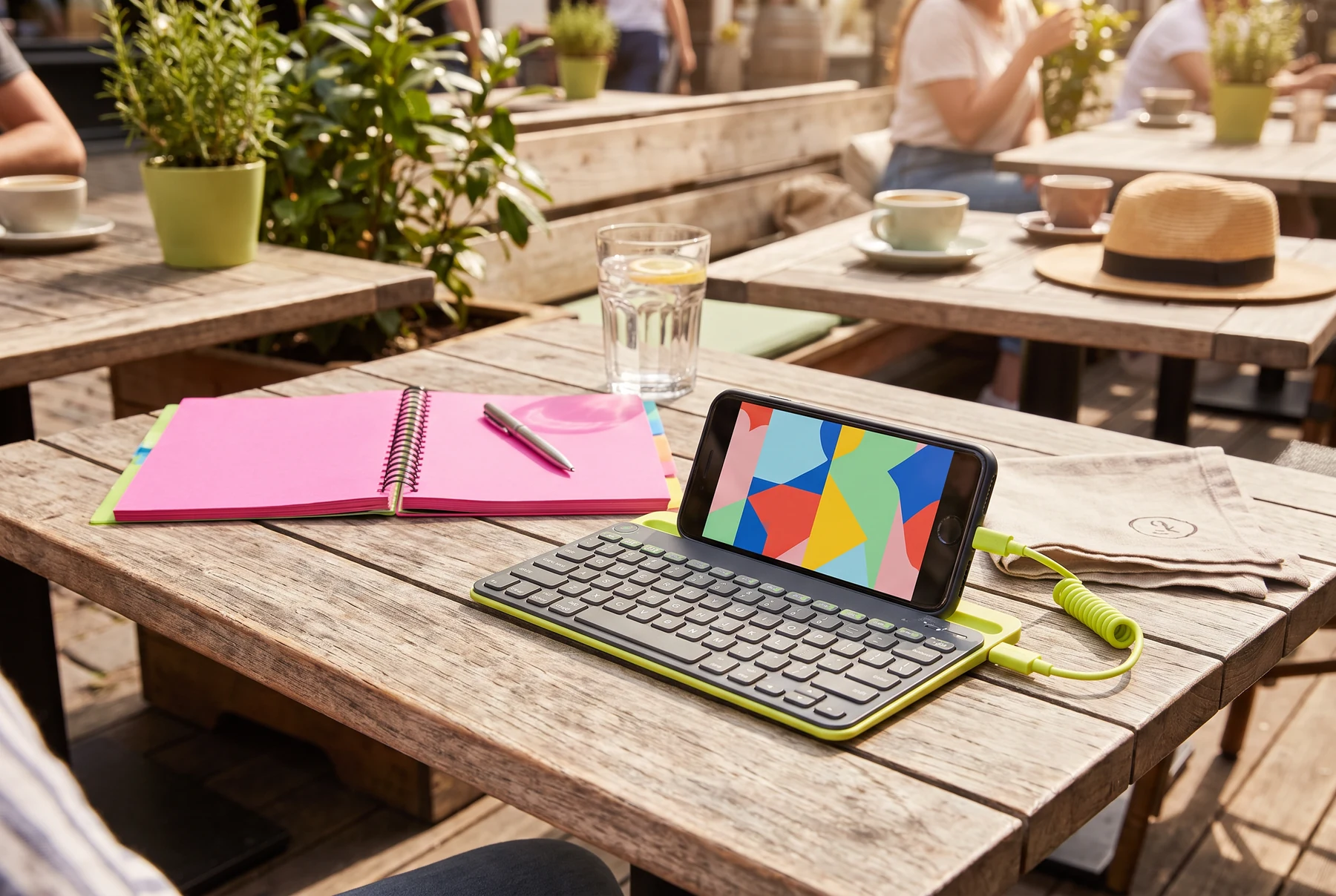 Mobile workspace at an outdoor cafe table
